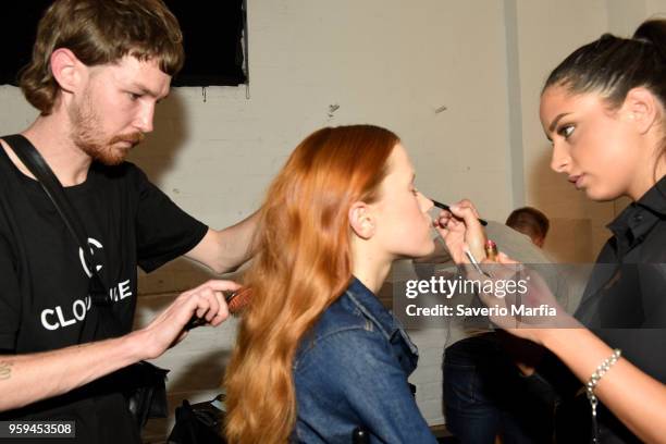 Model prepares backstage ahead of the C/Meo Collective show at Mercedes-Benz Fashion Week Resort 19 Collections at Carriageworks on May 15, 2018 in...