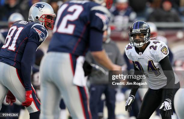 Dominique Foxworth of the Baltimore Ravens lines up on defense across from Randy Moss of the New England Patriots during the 2010 AFC wild-card...