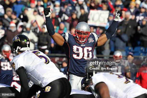 Adalius Thomas of the New England Patriots gestures as he gets set on defense against the Baltimore Ravens during the 2010 AFC wild-card playoff game...