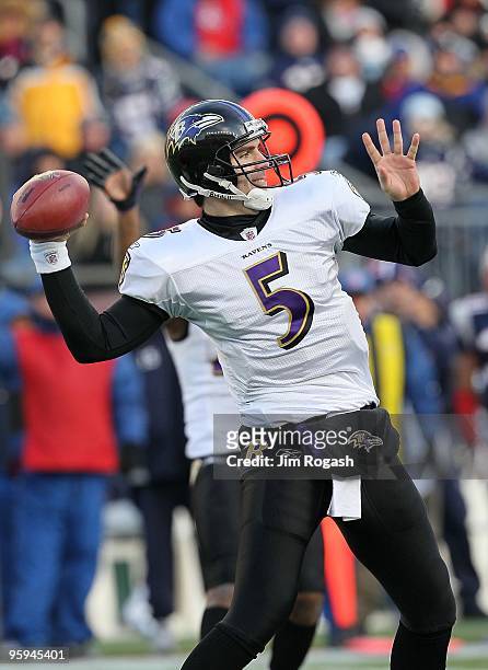Quarterback Joe Flacco of the Baltimore Ravens throws a pass against the New England Patriots during the 2010 AFC wild-card playoff game at Gillette...
