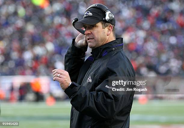 Head coach John Harbaugh of the Baltimore Ravens looks on against the New England Patriots during the 2010 AFC wild-card playoff game at Gillette...