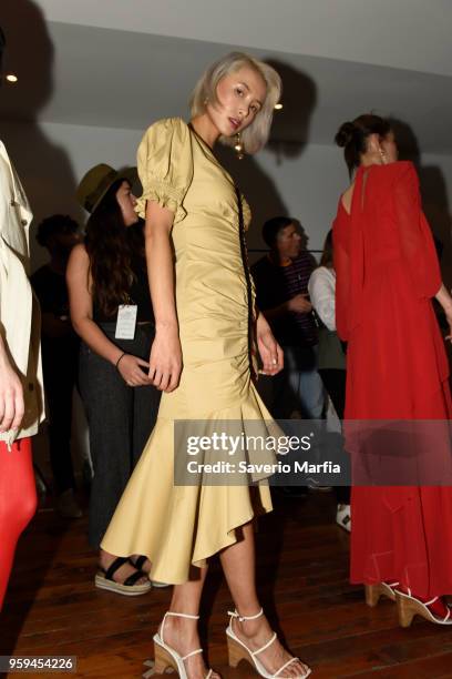 Model prepares backstage ahead of the C/Meo Collective show at Mercedes-Benz Fashion Week Resort 19 Collections at Carriageworks on May 15, 2018 in...