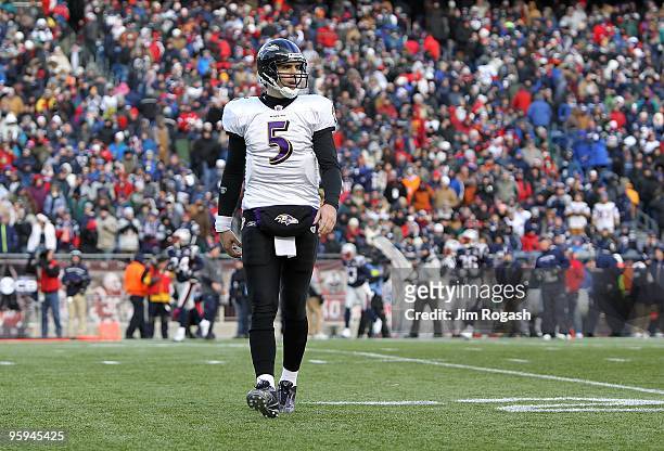 Quarterback Joe Flacco of the Baltimore Ravens looks towards the sideline against the New England Patriots during the 2010 AFC wild-card playoff game...
