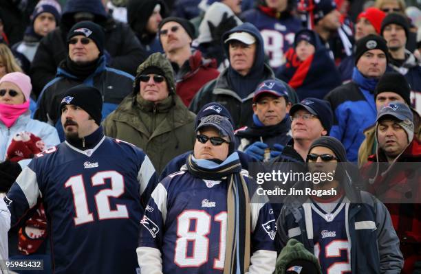 Fans of the New England Patriots look on dejected from the stands late in the second half against the Baltimore Ravens during the 2010 AFC wild-card...