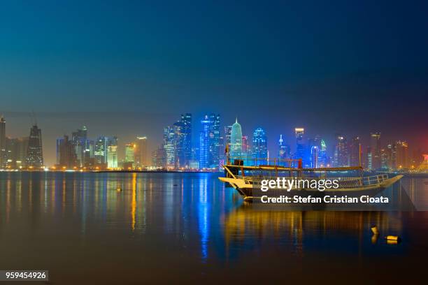 night over doha qatar - dhow doha stock pictures, royalty-free photos & images