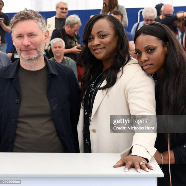 Director Kevin Macdonald, producer Pat Houston and producer Rayah Houston attend the photocall for the "Whitney" during the 71st annual Cannes Film...