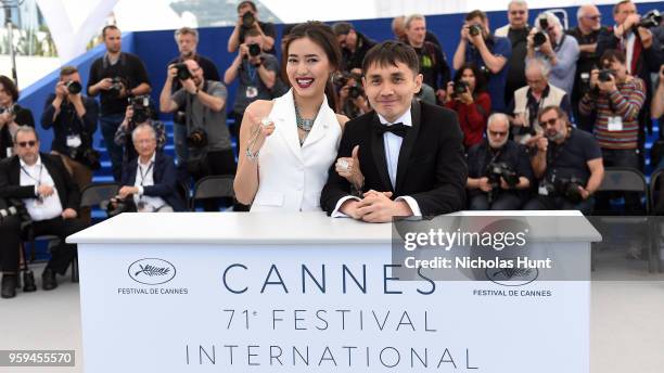 Actress Dinara Baktybaeva and director Adilkhan Yerzhanov attends "The Gentle Indifference Of The Word" Photocall during the 71st annual Cannes Film...