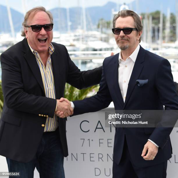 Producer Douglas Urbanski and actor Gary Oldman attend the Rendez-Vous with Gary Oldman Photocall during the 71st annual Cannes Film Festival at...