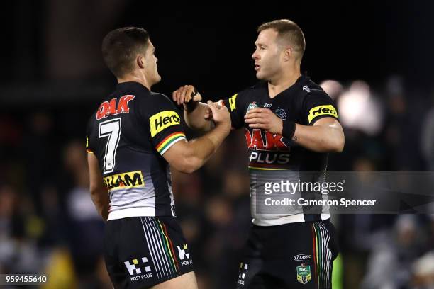Nathan Cleary of the Panthers and team mate Trent Merrin celebrate winning the round 11 NRL match between the Penrith Panthers and the Wests Tigers...