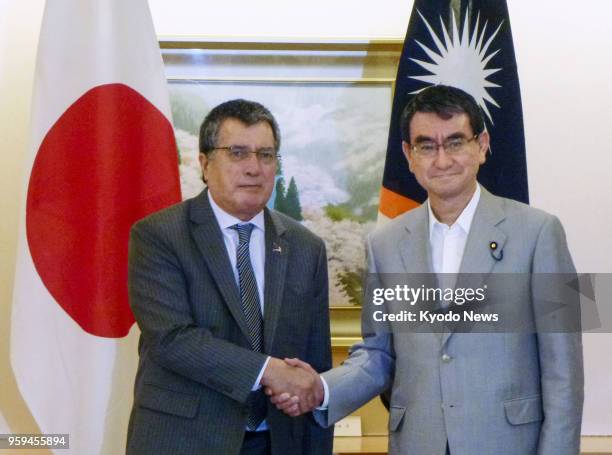 Marshallese Foreign and Trade Minister John M. Silk shakes hands with Japanese Foreign Minister Taro Kono in Tokyo on May 17, 2018. ==Kyodo