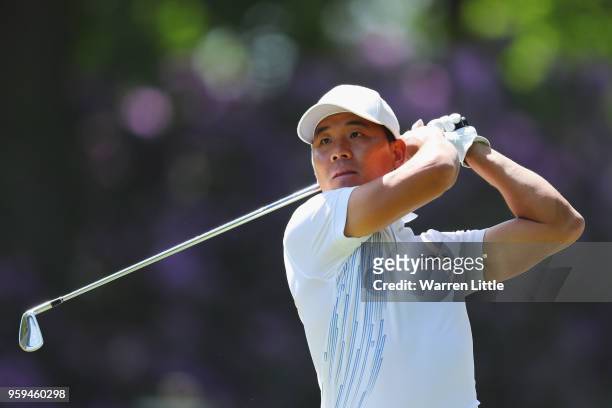 Ashun Wu of China plays his shot off the 2nd tee during the first round of the Belgian Knockout at the Rinkven International Golf Club on May 17,...
