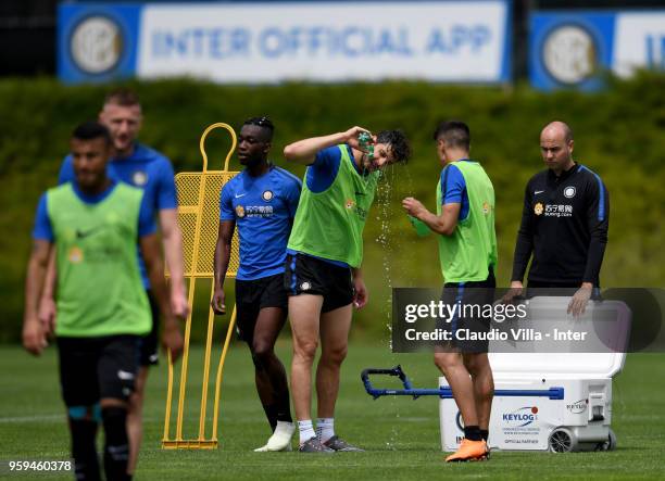 Andrea Ranocchia of FC Internazionale drinks during the FC Internazionale training session at the club's training ground Suning Training Center in...