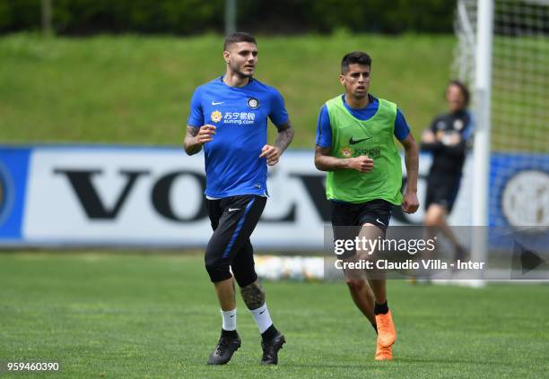 Mauro Icardi and Joao Cancelo of FC Internazionale in action during the FC Internazionale training session at the club's training ground Suning...