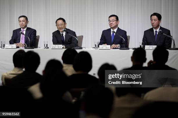 From left to right, Hiroto Saikawa, president and chief executive officer of Nissan Motor Co. And vice chairman of JAMA, Akio Toyoda, president of...