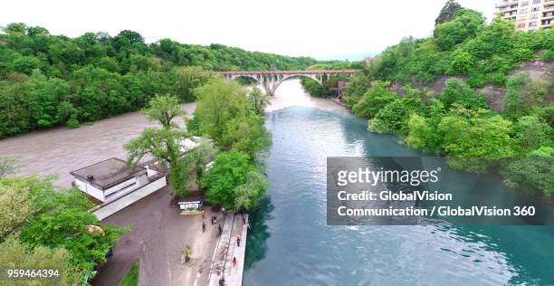 breathtaking image of river junction in geneva, switzerland - rhone river stock pictures, royalty-free photos & images