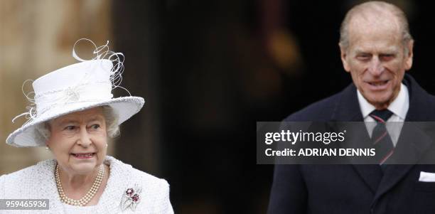 Britain's Queen Elizabeth II and Prince Philip leave Westminster Abbey, in central London, 19 November 2007, after a service of celebration to mark...