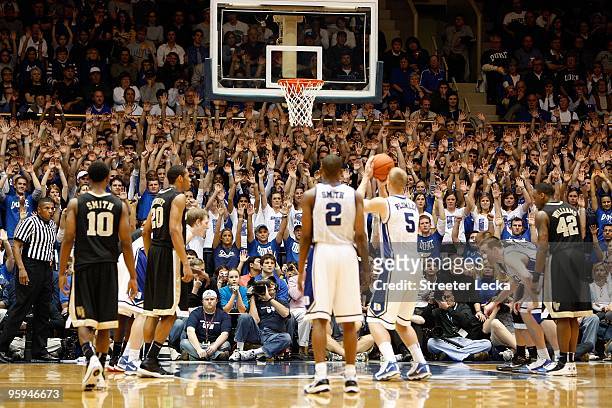 Fans of the Duke Blue Devils cheer as Mason Plumlee makes a free throw during the game against the Wake Forest Demon Deacons on January 17, 2010 in...