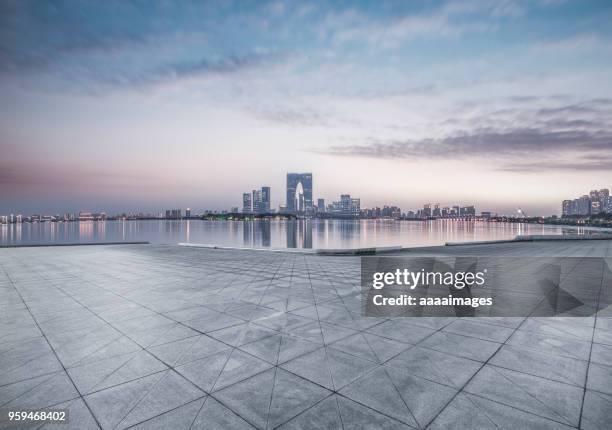 empty town square with suzhou skyline on background - modern town square stock pictures, royalty-free photos & images