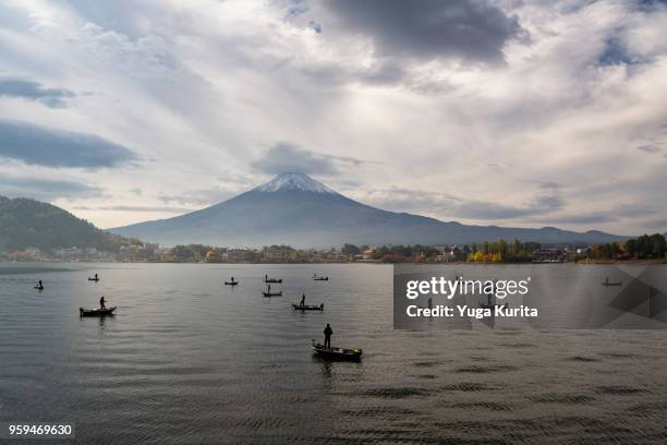 mt. fuji and anglers - yuga kurita stock pictures, royalty-free photos & images