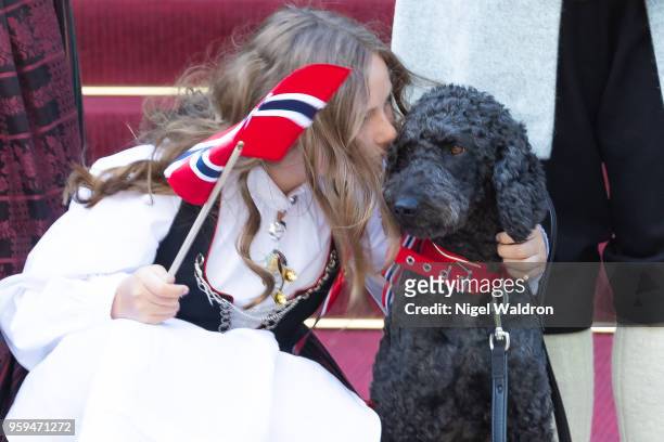 Princess Ingrid Alexandra of Norway cuddling her pet dog Milly Kakao during the Norwegian National Day at Skaugum, Asker during Norway's National Day...