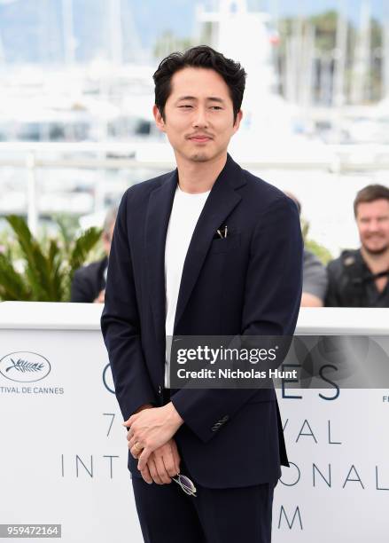 Steven Yeun attends the "Burning" Photocall during the 71st annual Cannes Film Festival at Palais des Festivals on May 17, 2018 in Cannes, France.