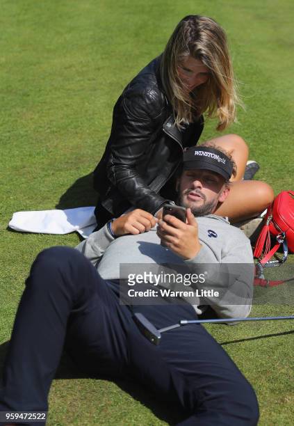 Joost Luiten from the Netherlands relaxes with his girlfriend Lyan Zielhorst after the first round of the Belgian Knockout at the Rinkven...