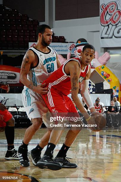 Trey Gilder of the Maine Red Claws is defended by Keith Brumbaugh of the Sioux Falls Skyforce during the 2010 D-League Showcase at Qwest Arena on...