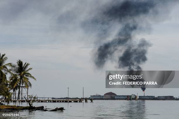 View of an oil refinery in the Maracaibo lake, on May 2, 2018 in Maracaibo, Venezuela. Amid blackouts, skyrocketing prices, shortage of food,...