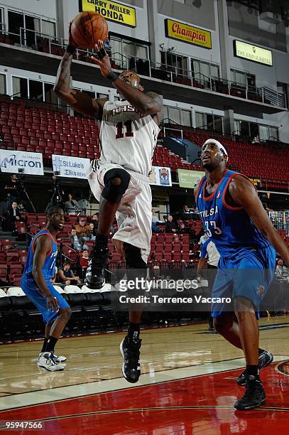 Dontell Jefferson of the Utah Flash goes up for a shot over DJ White of the Tulsa 66ers in the 2010 D-League Showcase at Qwest Arena on January 5,...