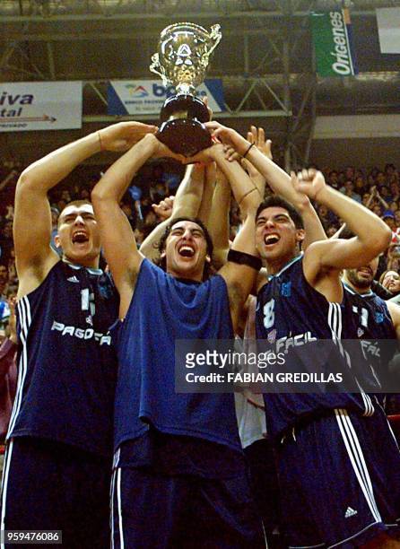 Ruben Wolkowinski , Hugo Sconochini , and Lucas Victoriano of Argentina celebrate after winning the Pre-World Basketball Tournament of the Americas...