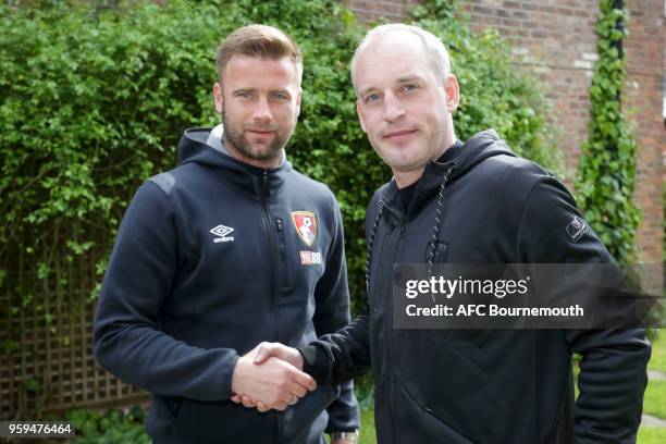 Bournemouth's Artur Boruc, shakes hands with the club's chief executive Neill Blake after signing a 1 year extension to his current contract on May...