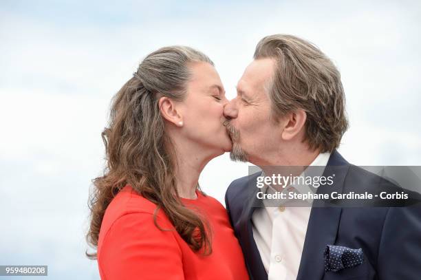 Gary Oldman and wife Gisele Schmidt attend Rendez-Vous With Gary Oldman Photocall during the 71st annual Cannes Film Festival at Palais des Festivals...