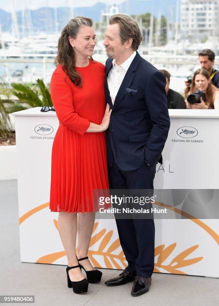 British actor Gary Oldman poses with his wife Gisele Schmidt at the Rendez-Vous with Gary Oldman Photocall during the 71st annual Cannes Film...