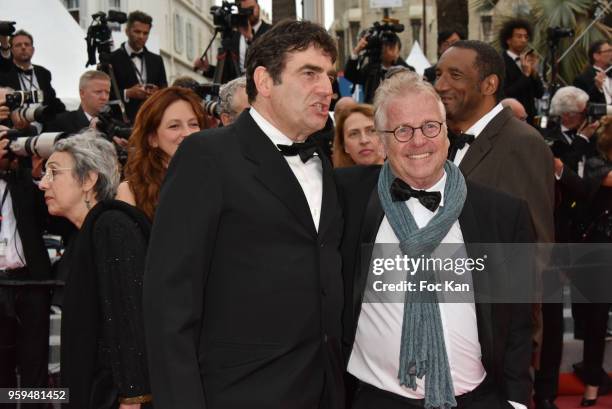 Romain Goupil and Daniel Cohn Bendit attend the screening of 'Burning' during the 71st annual Cannes Film Festival at Palais des Festivals on May 16,...