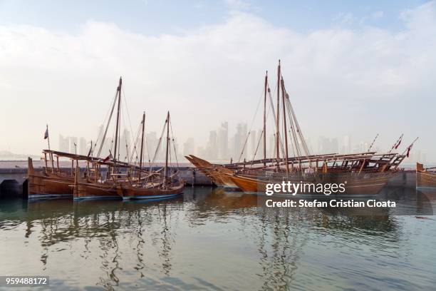 dhow harbour doha qatar - dhow stock pictures, royalty-free photos & images