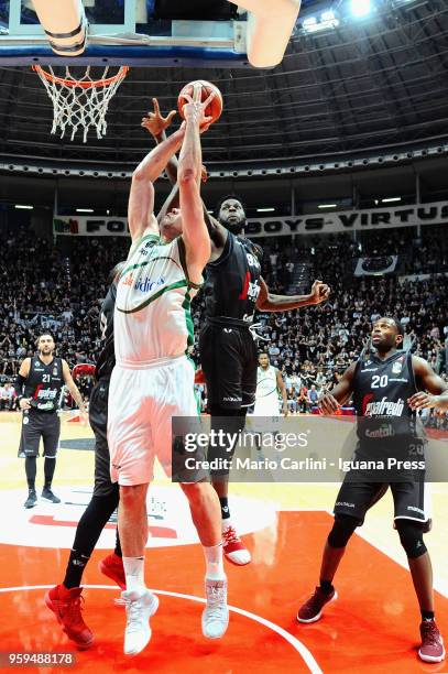 Kyrylo Fesenko of Sidigas competes with Pietro Aradori - Marcus Slaughter - Jamil Wilson - Oliver Lafayette of Segafredo during the LBA LegaBasket...