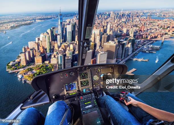 helicopter flight in downtown manhattan. new york. usa - helicopter point of view stock pictures, royalty-free photos & images