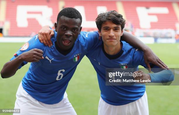 Paolo Gozzi Iweru of Italy and Giuseppe Leone of Italy celebrate their win over belgium during the UEFA European Under-17 Championship Semi Final...