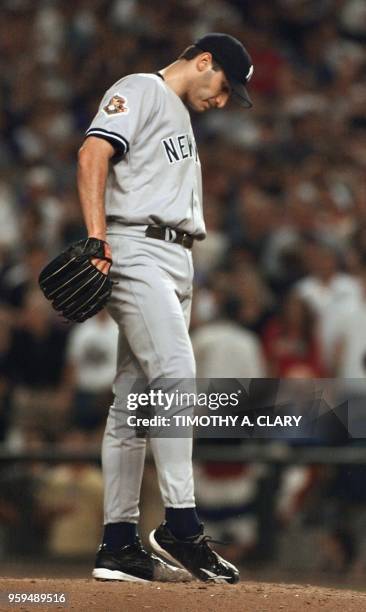 New York Yankees pitcher Andy Pettite kicks the dirt after another Arizona Diamondbacks hit in the third inning of Game 6 of the World Series in...