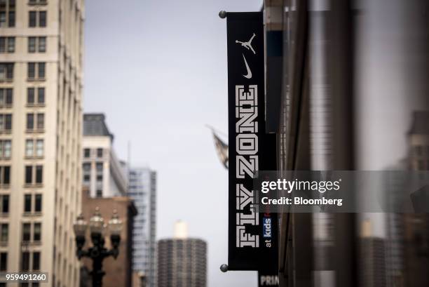 Nike Inc. Fly Zone signage hangs on display outside a Foot Locker Inc. Kids store in downtown Chicago, Illinois, U.S., on Sunday, May 13, 2018. Foot...