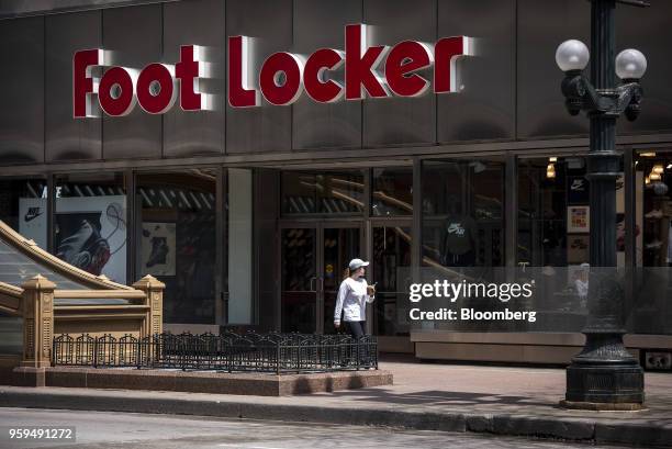 Pedestrian passes in front of a Foot Locker Inc. Store in downtown Chicago, Illinois, U.S., on Sunday, May 13, 2018. Foot Locker Inc. Is scheduled to...