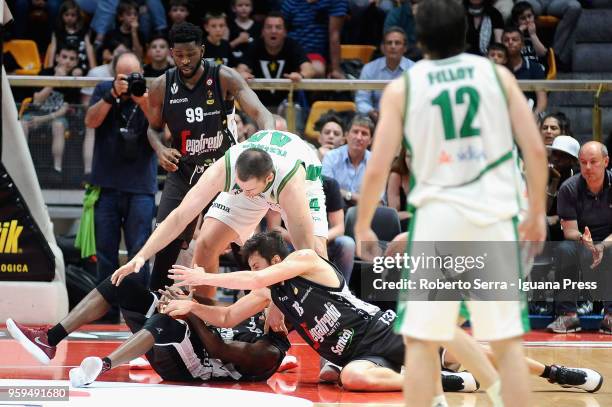 Kyrylo Fesenko of Sidigas competes with Jamil Wilson and Oliver Lafayette and Klaudio Ndoja of Segafredo during the LBA LegaBasket match between...