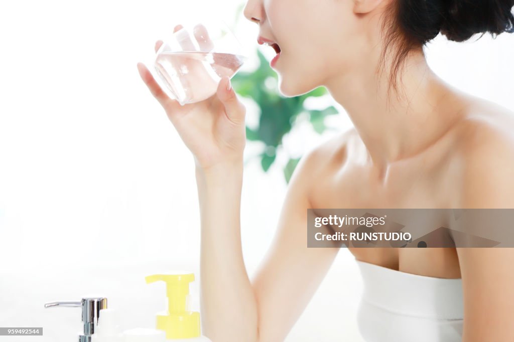 Woman Drinking Glass of Water