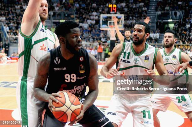 Jamil Wilson of Segafredo competes with Marteen Leunen and Thomas Scrubb and Lorenzo D'Ercole of Sidigas during the LBA LegaBasket match between...