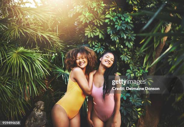 tropical beauties - swimwear stock pictures, royalty-free photos & images