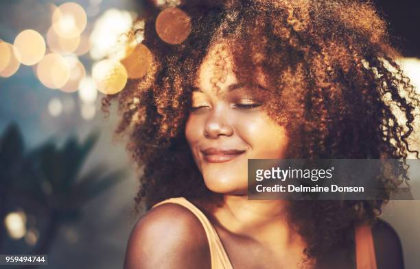glowing like a gold goddess - beautiful black women in bathing suits stock pictures, royalty-free photos & images