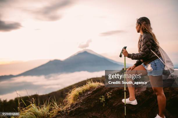 female hiker - agung stock pictures, royalty-free photos & images