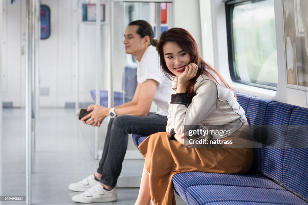 Happy female commuter