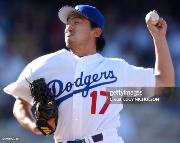 Los Angeles Dodgers' Kazuhisa Ishii pitches against the Atlanta Braves in the top of the first inning, in Los Angeles, CA, 25 August 2002. Ishii gave...