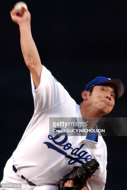 Los Angeles Dodgers' Hideo Nomo pitches against the Cincinnati Reds in the top of the first inning 01 May 2002 in Los Angeles, CA. AFP PHOTO/Lucy...